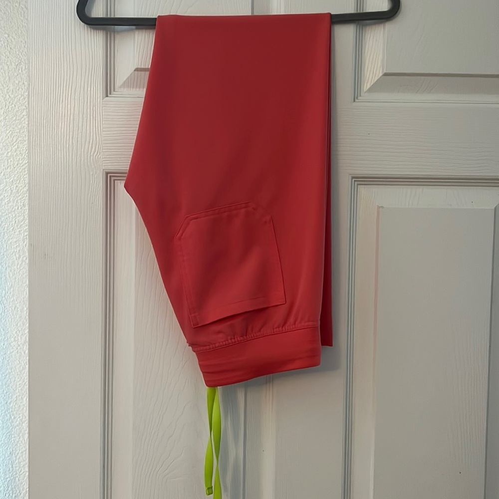Like New Figs “Hot Coral” Livingston pants. Size XSP. Limited edition color.